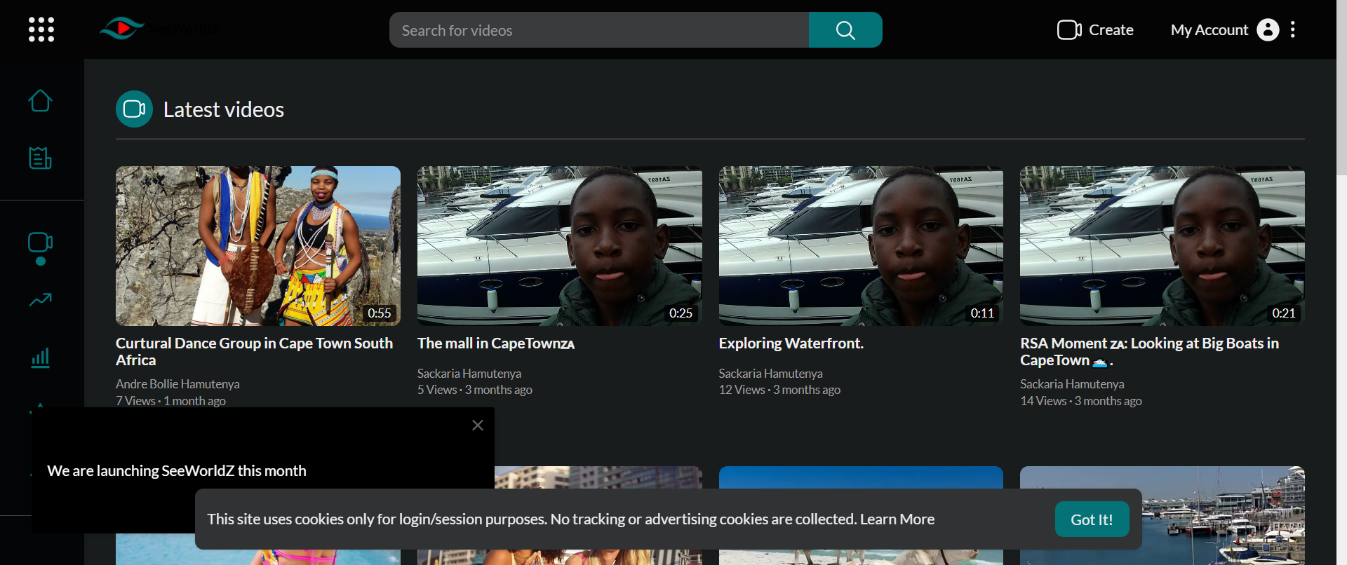 The latest videos section allows users to discover recently shared travel and adventure videos from the community.